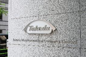 Takeda Pharmaceutical Company signboard and logo